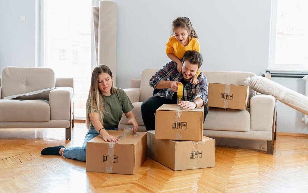 Family preparing belongings for a long-distance move
