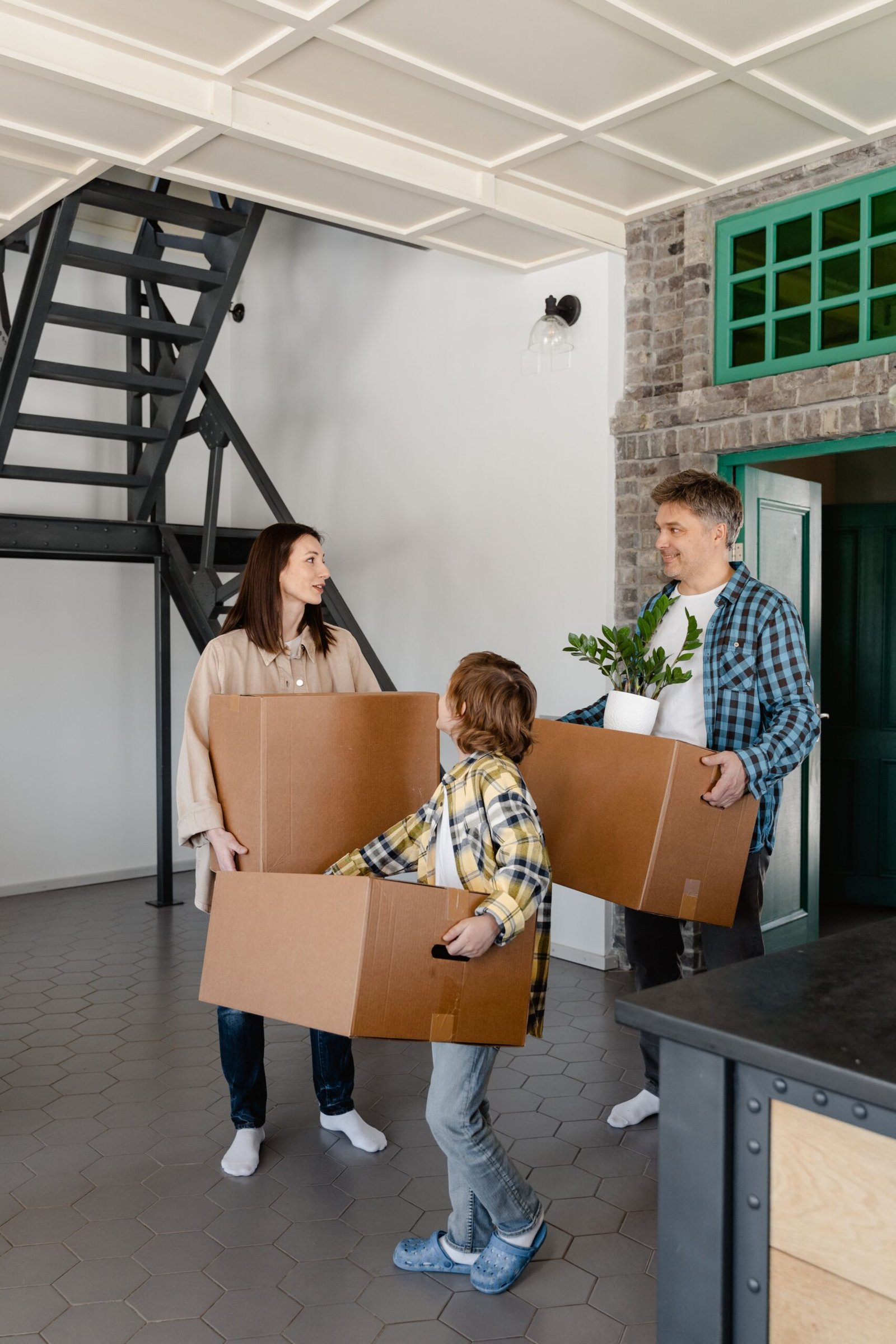 Family using moving and storage services during a long-distance relocation